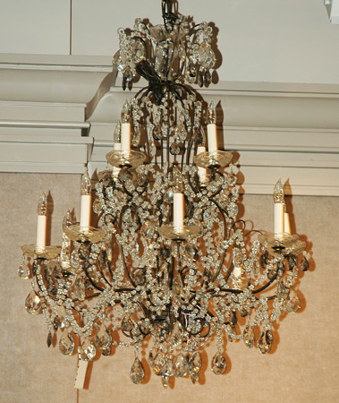 Appraisal: Rococo Style Patinated-Metal Twelve-Light Chandelier Estimate -