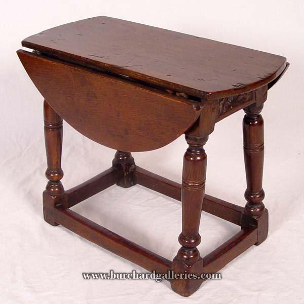 Appraisal: LATE TH C ENGLISH DROP LEAF STOOL Round top with