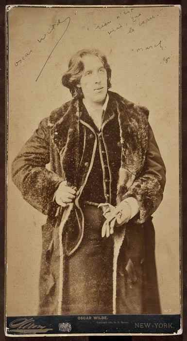 Appraisal: Wilde Oscar writer - Photographic portrait of Wilde signed and