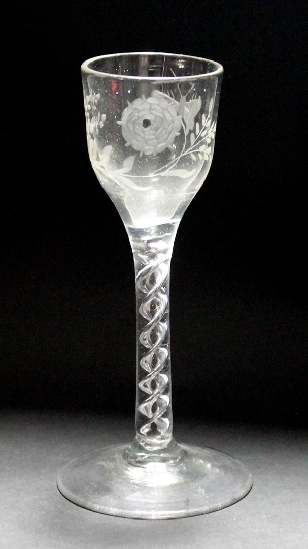 Appraisal: An engraved mercury twist' wine glass circa the ogee bowl