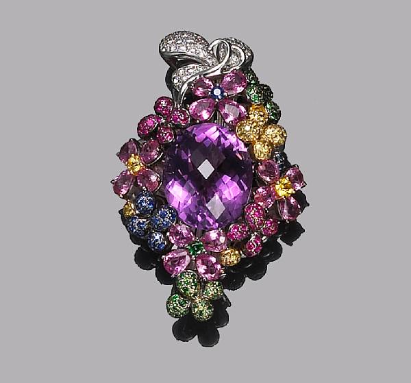 Appraisal: A diamond and gem-set pendant centering an oval-shaped amethyst measuring