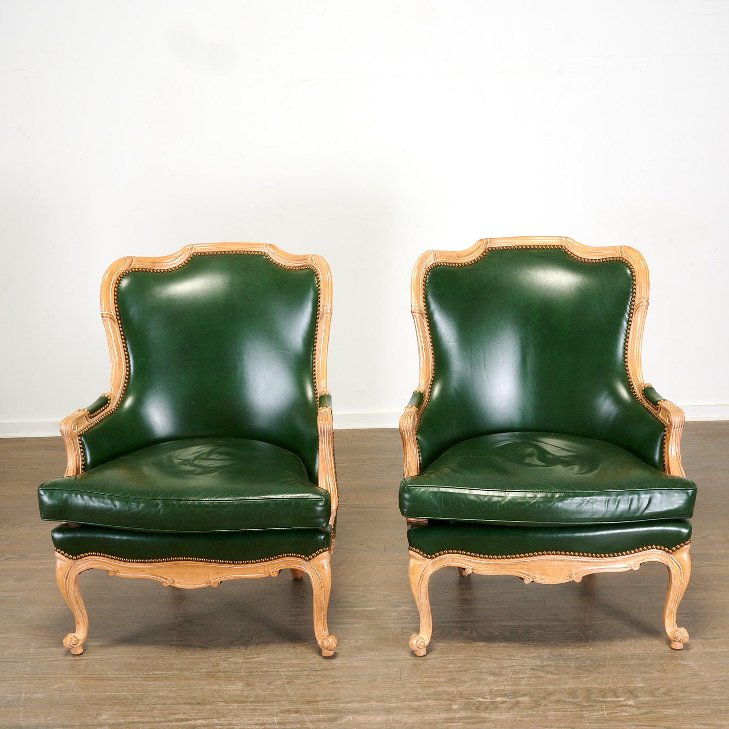 Appraisal: HANCOCK MOORE PAIR BALFOUR ARMCHAIRS th c American forest green