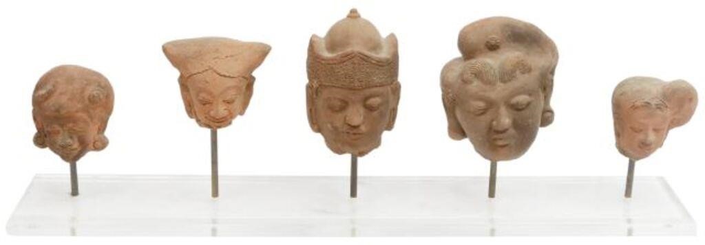 Appraisal: lot of Majapahit terracotta heads Java Indonesia rising on acrylic