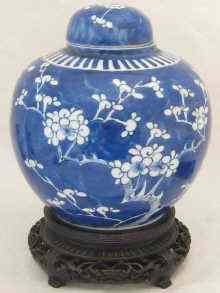 Appraisal: A Chinese ginger jar with cover and stand cm diameter