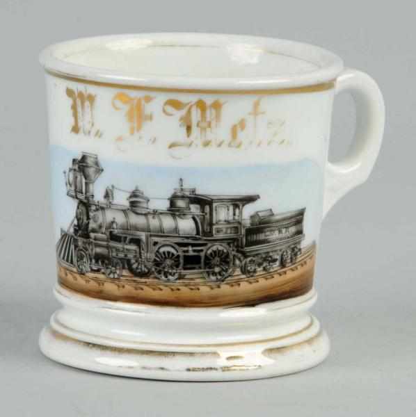 Appraisal: Shaving Mug with Railroad Engine Tender Description Marked T V