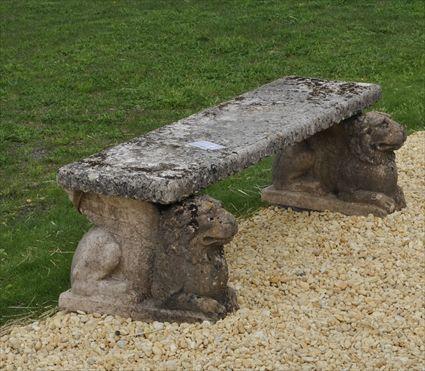 Appraisal: CARVED STONE BENCH The rectangular seat supported by winged lions