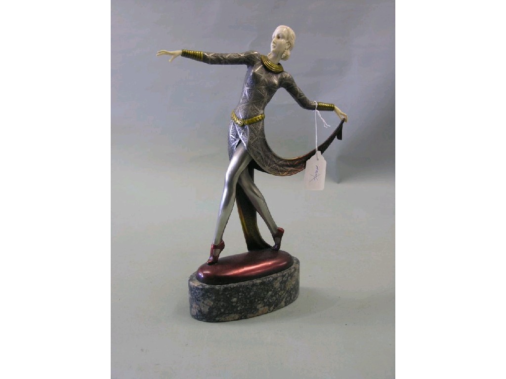 Appraisal: A reproduction Art Deco statuette dancing female with simulated ivory