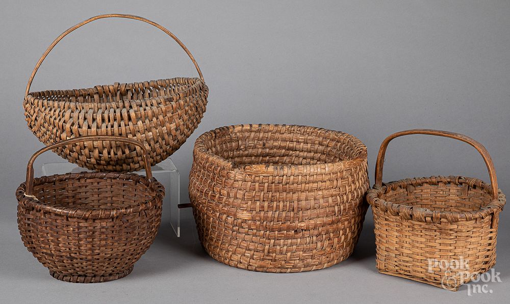 Appraisal: Four assorted baskets th c Four assorted baskets th c