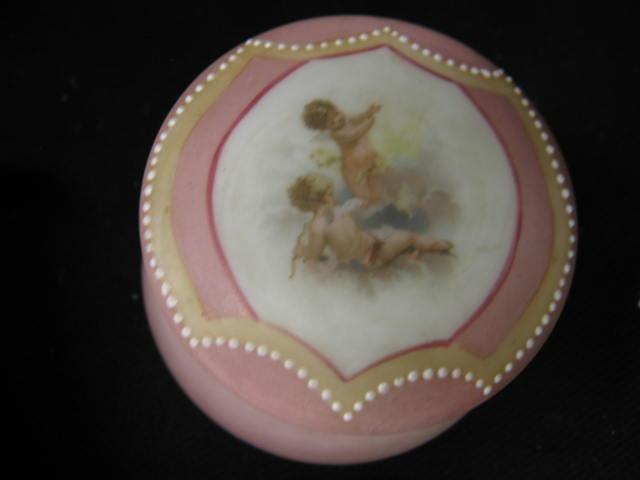 Appraisal: Nakara Victorian Art Glass Dresser Box cherub decor pink satin