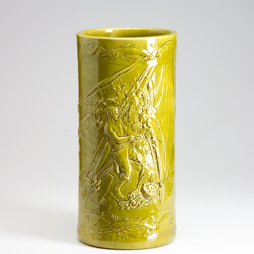 Appraisal: Rare UPJOHN cylindrical umbrella stand embossed with fisherman and covered