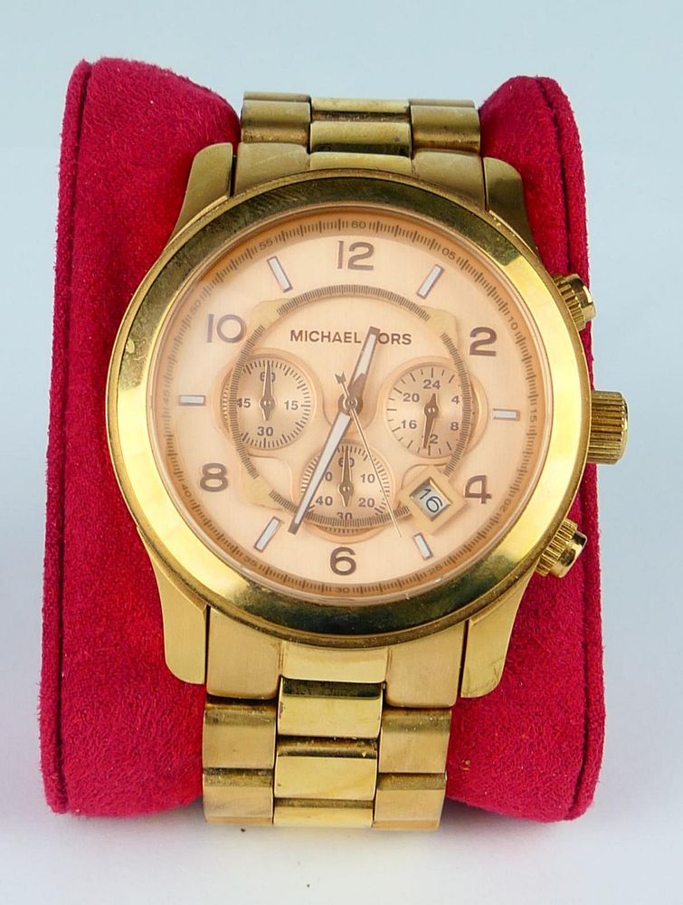 Appraisal: MICHAEL KORS GENTS HEAVY GOLD TONE WATCH The watch was