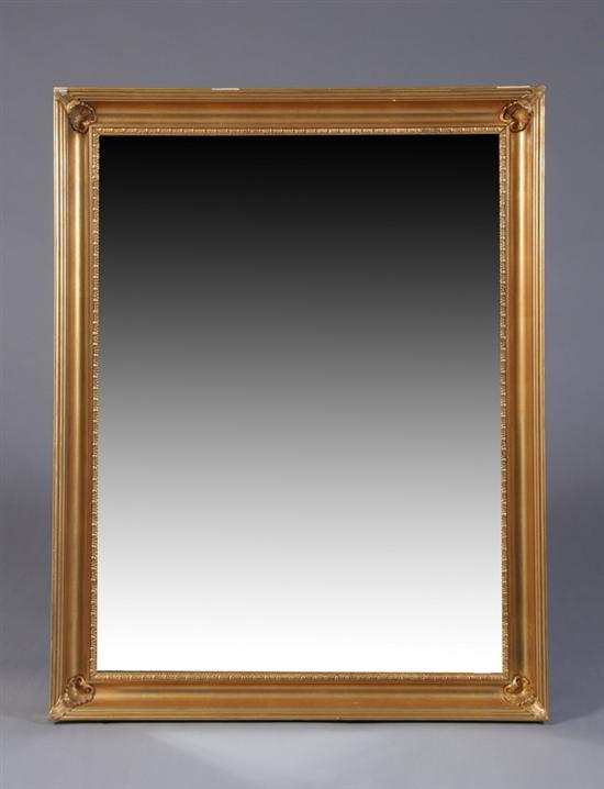 Appraisal: NEOCLASSICAL STYLE GILT WALL MIRROR th century gilt-wood Rectangular frame