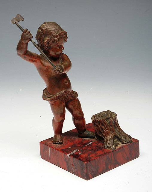 Appraisal: A LATE TH CENTURY BRONZE FIGURE of a cherub wielding