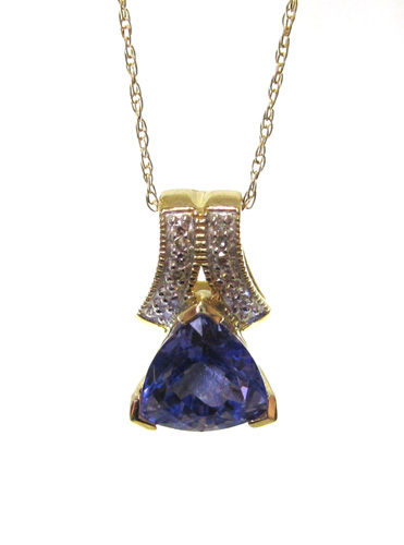 Appraisal: TANZANITE DIAMOND AND TEN KARAT GOLD PENDANT NECKLACE featuring a