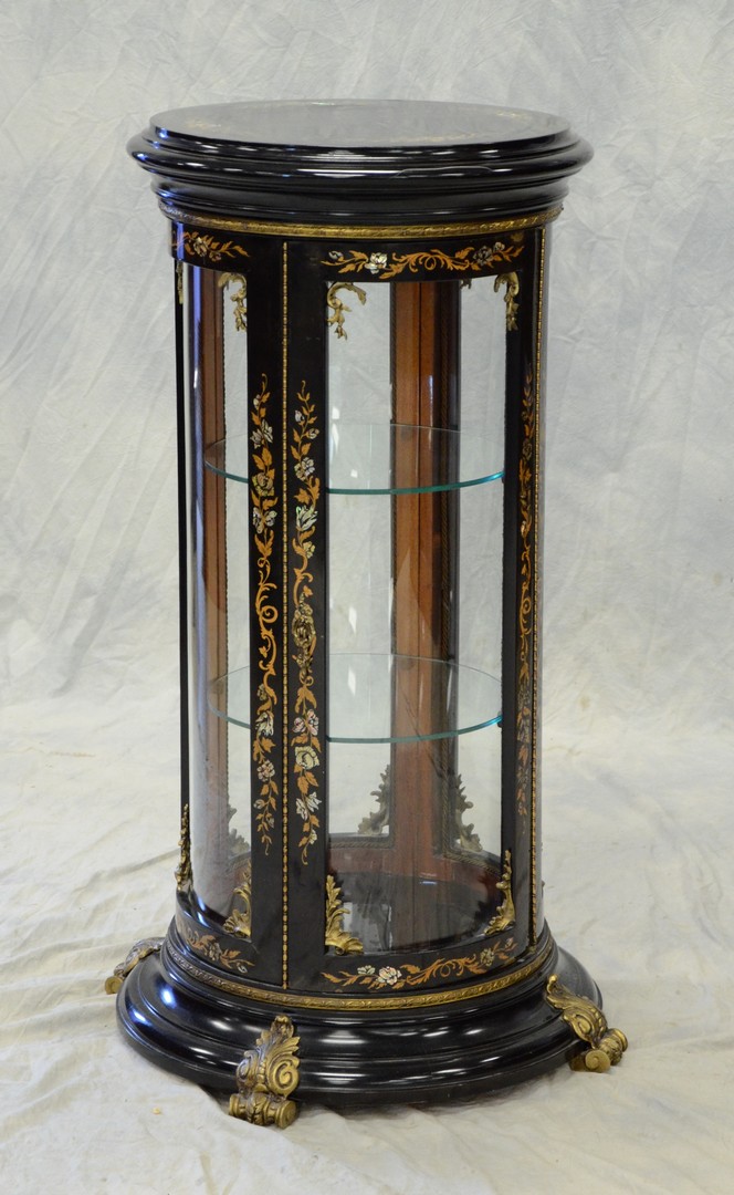 Appraisal: Circular ebonized gilt metal mounted vitrine gilt decoration with mother