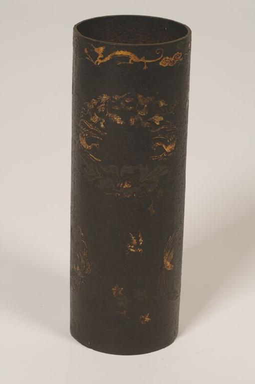 Appraisal: A CYLINDRICAL IRON VASE cast in gold-splash with foliage beneath