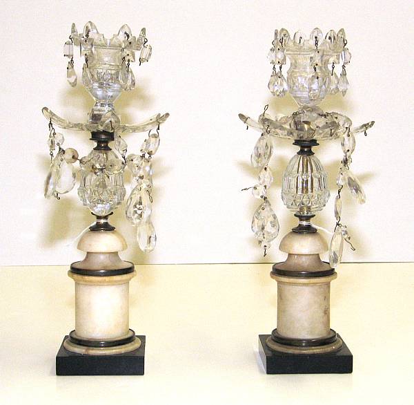 Appraisal: A pair of George III cut glass and marble candlesticks