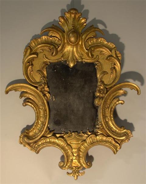 Appraisal: BAROQUE STYLE GOLD PAINTED MIRROR h w in