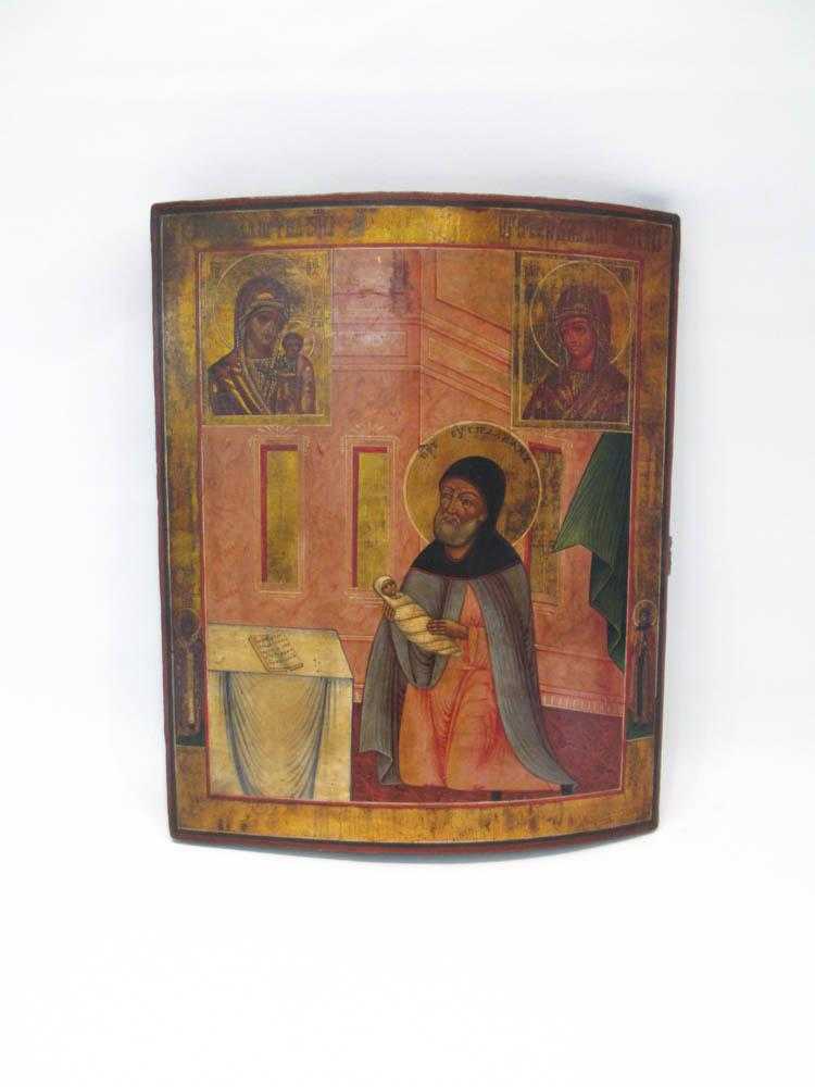 Appraisal: RUSSIAN ICON hand painted on arched wood panel Dimensions L