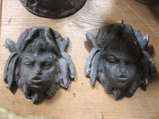 Appraisal: A SET OF THREE ANTIQUE LEAD MASKS in the form