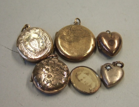 Appraisal: A half pearl set heart shaped pendant locket another heart