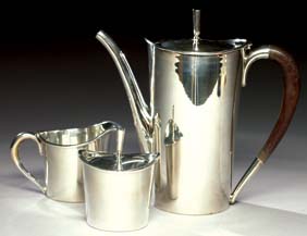 Appraisal: SILVER THREE PIECE COFFEE SET Very attractively modeled in Art