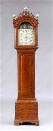 Appraisal: FEDERAL CHERRY LONGCASE CLOCK The arched bonnet with pierced fretwork