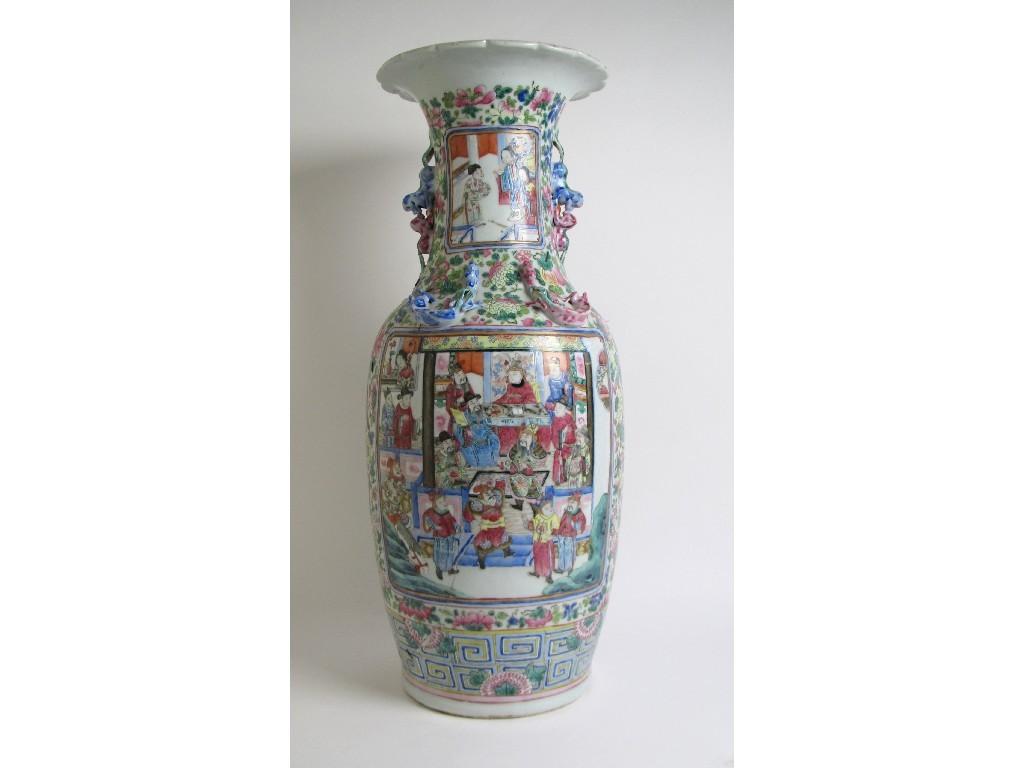 Appraisal: A Cantonese famille rose vase painted with panels of figures