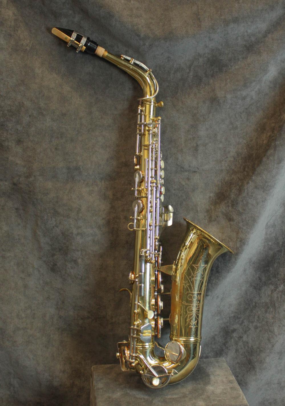 Appraisal: CONN SHOOTING STAR ALTO SAXOPHONE brass with nickel plated rods