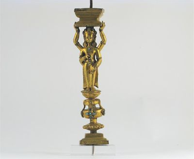 Appraisal: A Tibetan gilt bronze caryatid pillar cast with two four