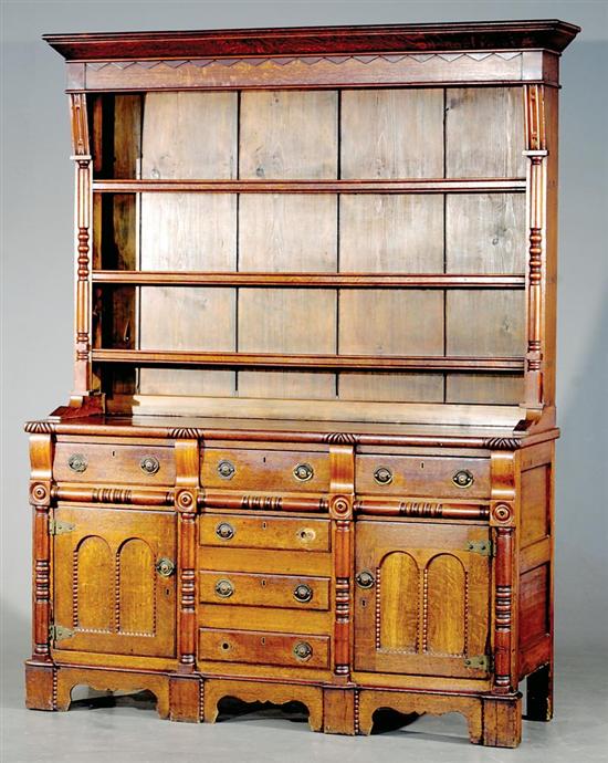 Appraisal: Welsh oak dresser mid th century canted crown and decorated