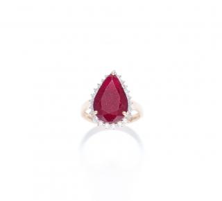 Appraisal: A PEAR CUT RUBY AND DIAMOND RING A PEAR CUT