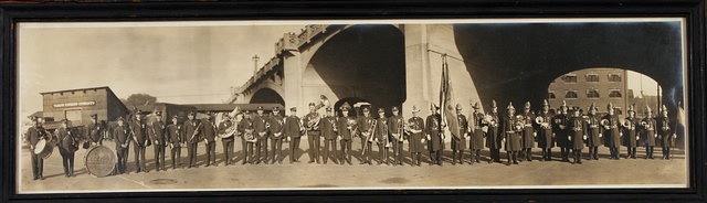 Appraisal: Panoramic photograph of Peerless Fire Company No band and color