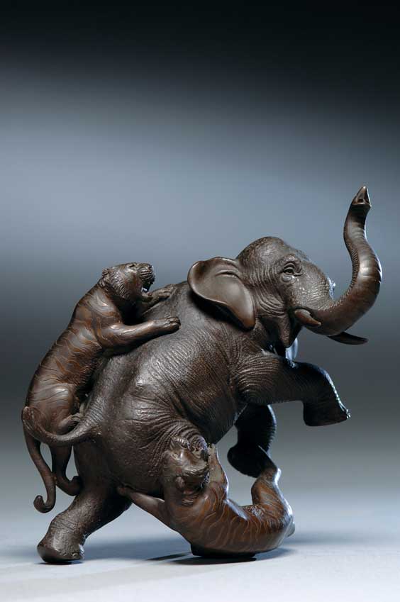 Appraisal: ANTIQUE JAPANESE BRONZE ELEPHANT Very animated antique Japanese bronze elephant