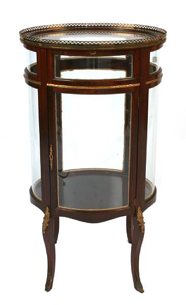 Appraisal: A Louis XV style gilt bronze mounted mahogany display cabinet