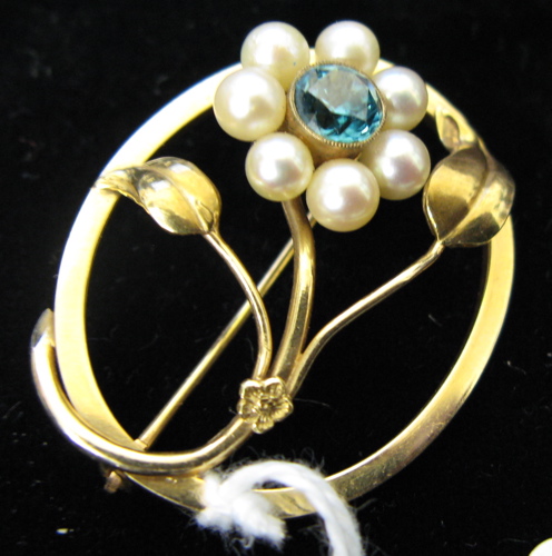 Appraisal: ZIRCON PEARL AND FOURTEEN KARAT GOLD FLORAL BROOCH oval in