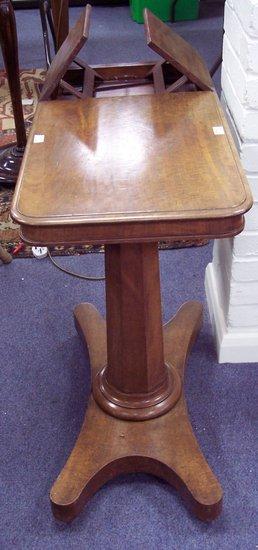 Appraisal: A th Century reading table with twin slopes on a