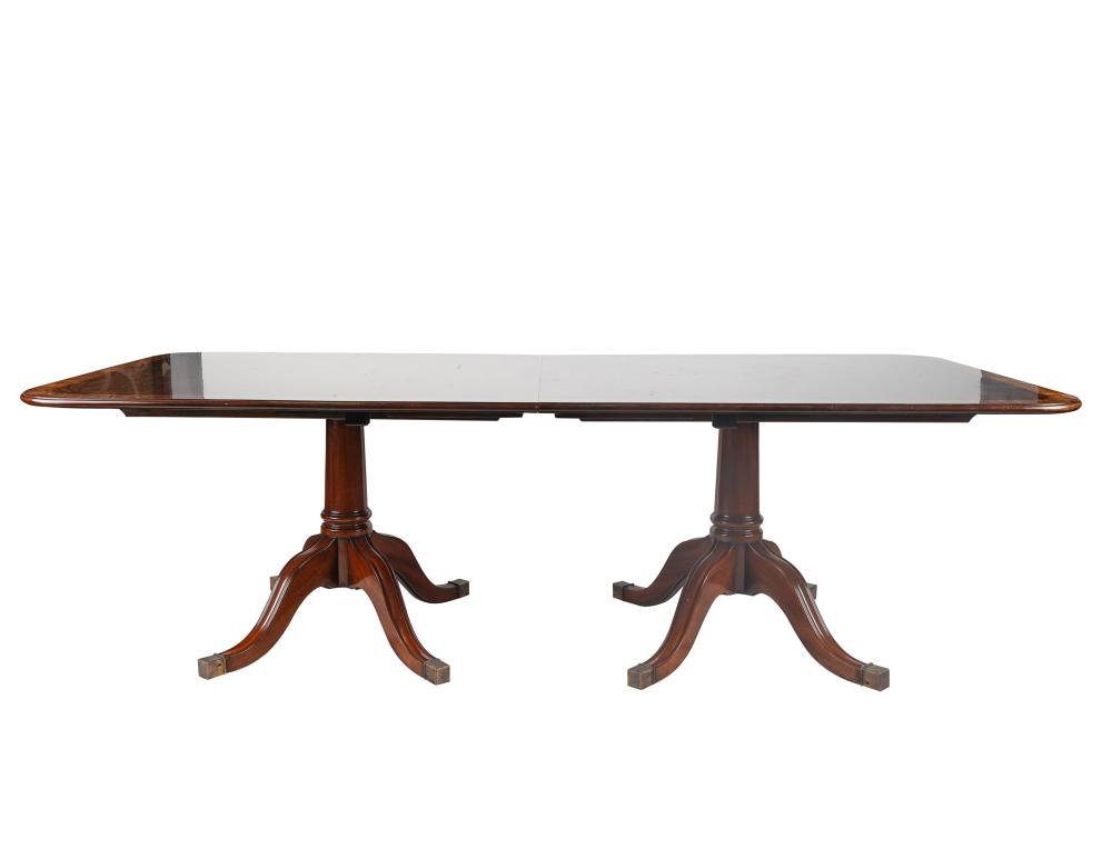 Appraisal: BURTON CHING LTD MAHOGANY DINING TABLERegency style with two leaves