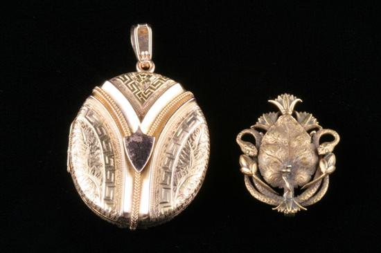 Appraisal: K YELLOW GOLD LOCKET AND K YELLOW GOLD SERPENT MOTIF