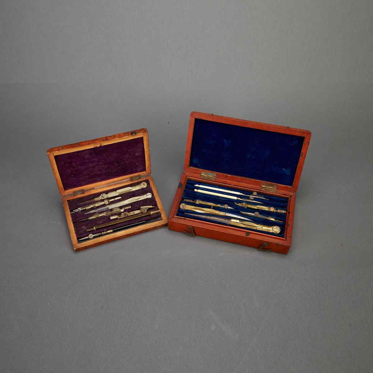 Appraisal: Two English Cased Drafting Sets th century each opening to