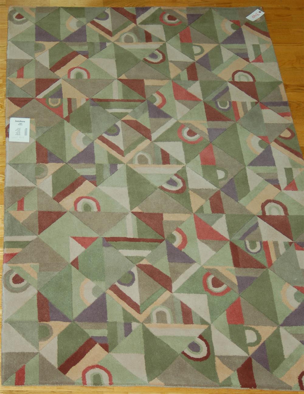 Appraisal: CONTEMPORARY WOOL RUG having a detailed geometric design colors of