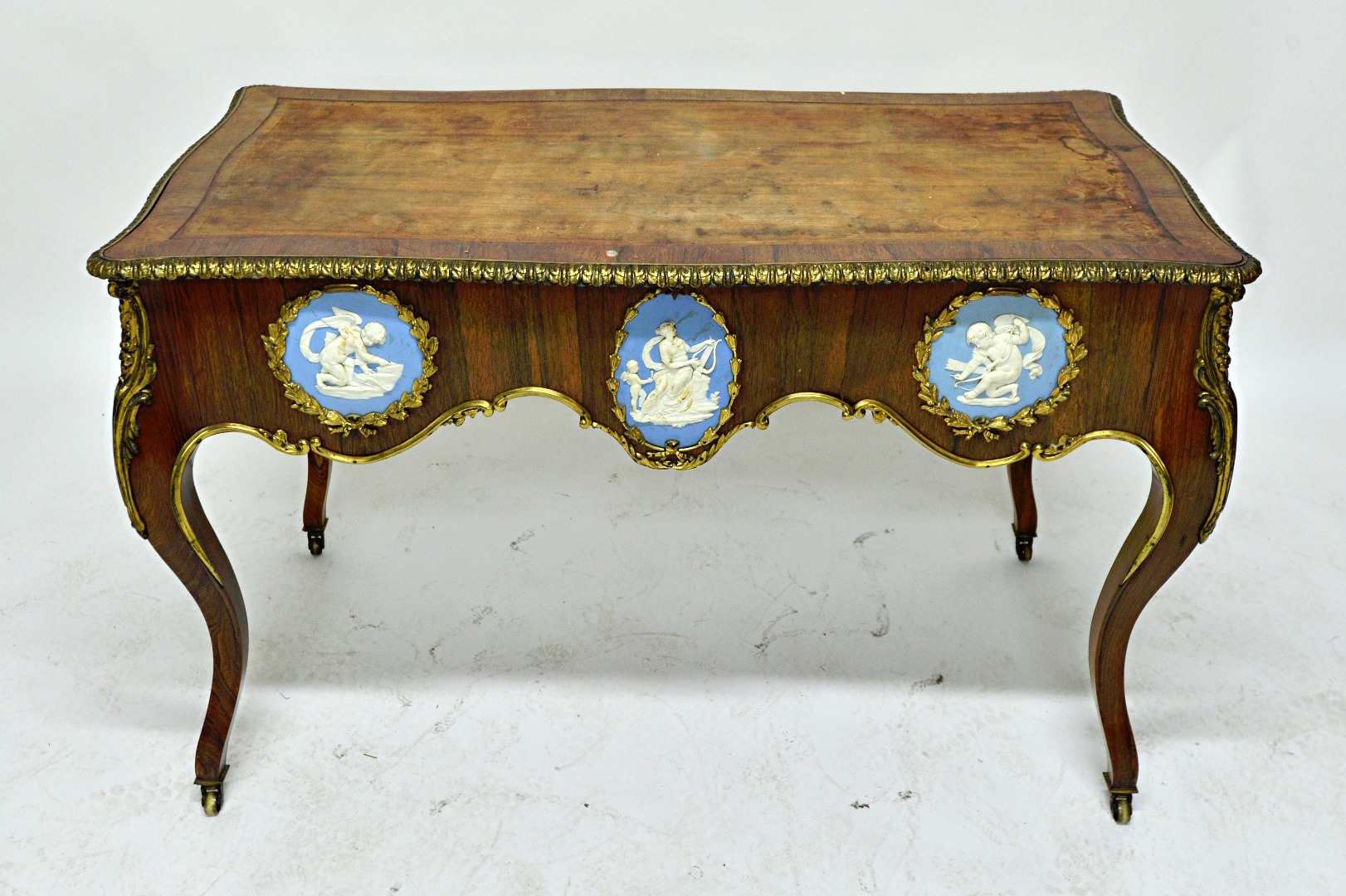 Appraisal: A th century gilt metal mounted rosewood centre writing table