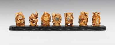 Appraisal: Set of Seven Immortals Netsuke Figures Seven netsuke which represent