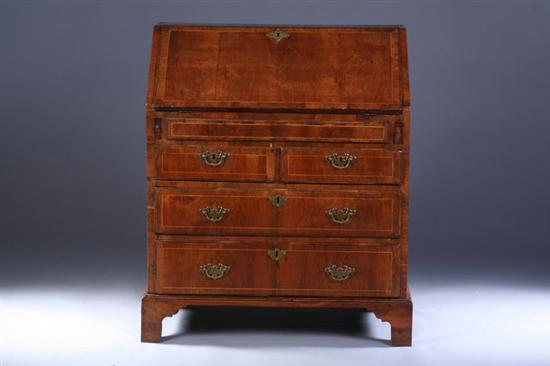 Appraisal: GEORGIAN WALNUT SLANT-FRONT DESK th century with replaced brasses String