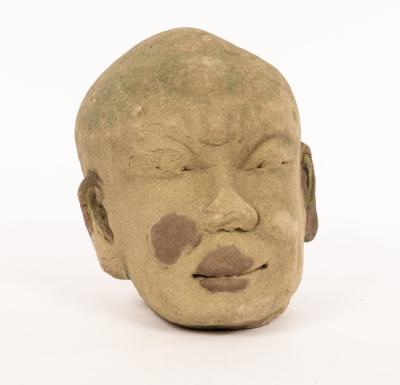 Appraisal: A Chinese carved stone head Yuan dynasty cm high