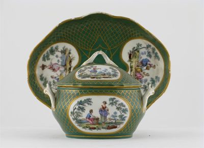 Appraisal: A Tournai-style sauce tureen cover and stand painted with scenes