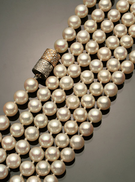 Appraisal: Opera Length Cultured Pearl and Diamond Necklace Knotted The single