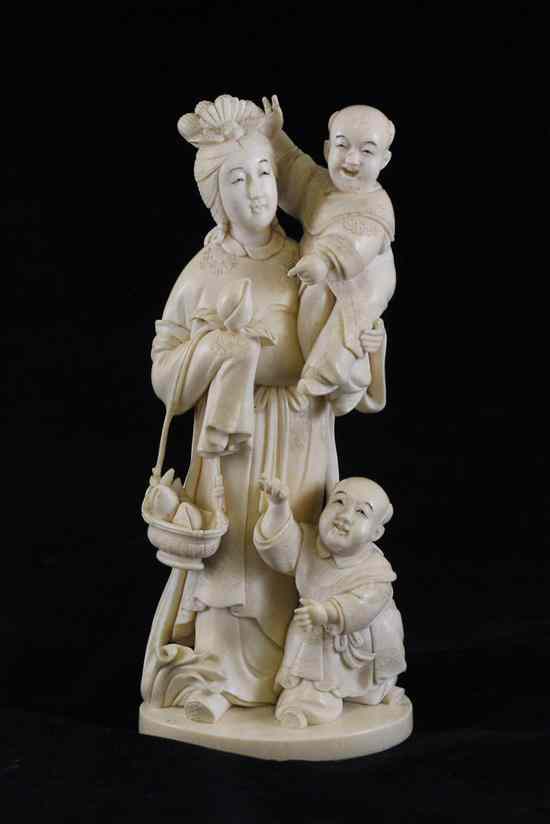 Appraisal: A Japanese ivory group of a goddess and two boys