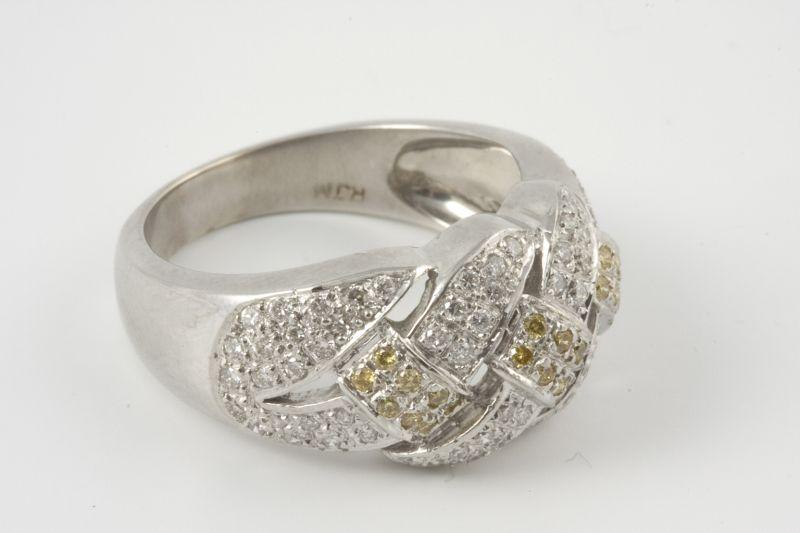 Appraisal: KT White Gold Diamond Weave Motif Ring with bead set