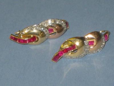 Appraisal: A PAIR OF RUBY AND DIAMOND EARRINGS comprising two rose